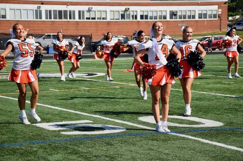 Varsity cheerleaders perform during halftime
