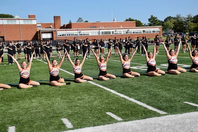Pirettes and marching band perform during halftime.