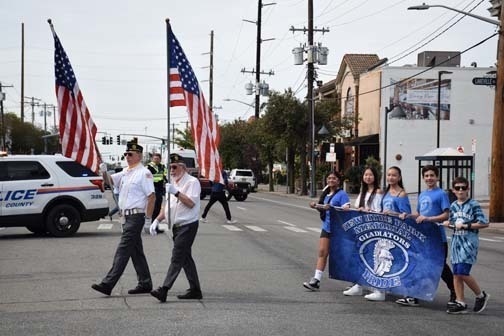 American Legion members and students begin the parade.
