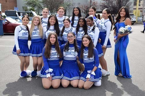 Romanettes pose for a photo before the parade.