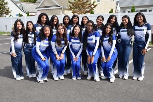 Step Team poses for a photo before the parade.