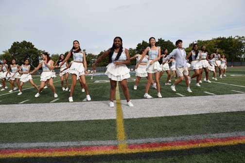 Twirlers perform during halftime show.