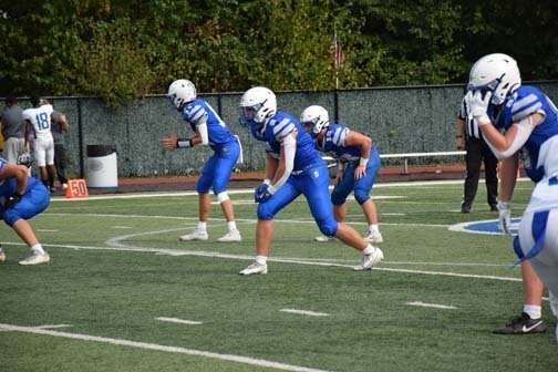 Gladiators football team is pictured on the field.