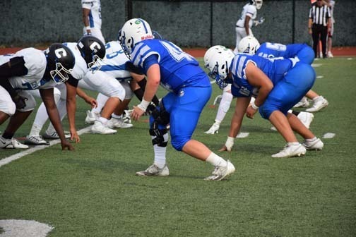 Gladiators football team is pictured on the field.