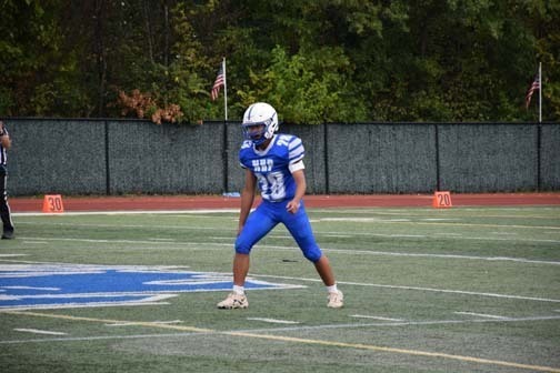 Gladiators football team is pictured on the field.