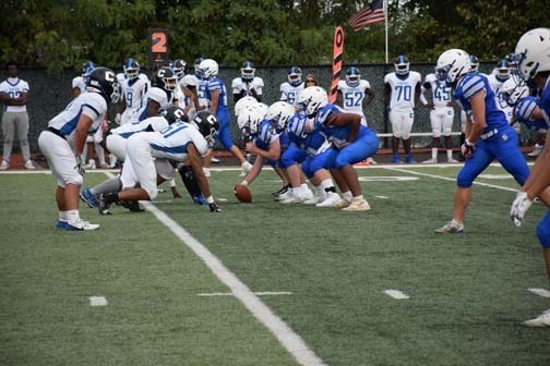 Gladiators football team is pictured on the field.