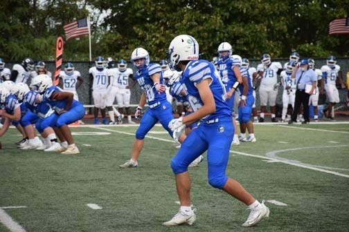 Gladiators football team is pictured on the field.