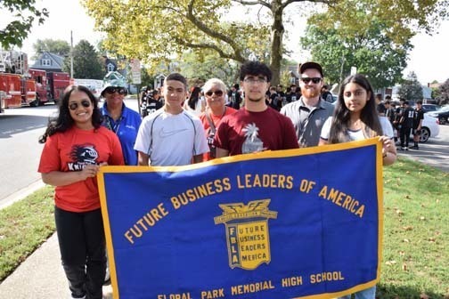 Future Business Leaders of America club members pose for a photo before the parade.