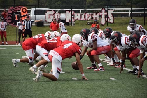 The Knights enter the field to start the homecoming game.