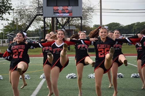 The Florettes perform during halftime.