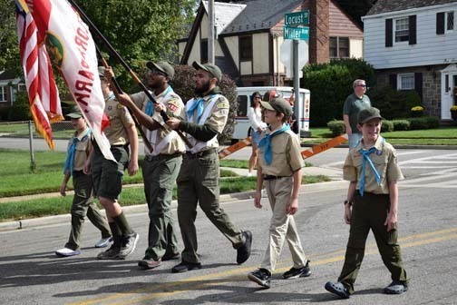 Student clubs join the procession of the parade.