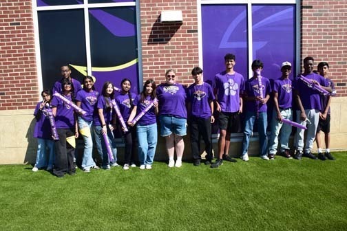 Key Club members pose for a photo before the homecoming parade.