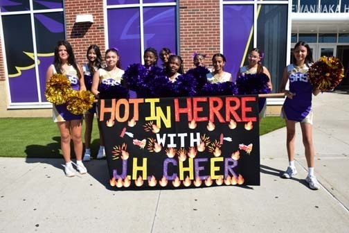 Junior High Cheerleaders pose for a photo before the homecoming parade.