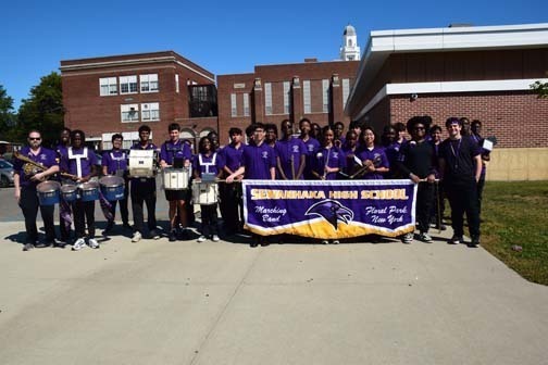 Marching band poses for a photo before the parade.