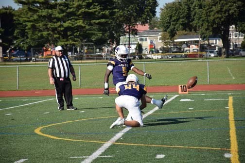 The Ravens are pictured on the field.