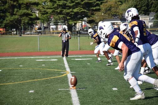 The Ravens are pictured on the field. 