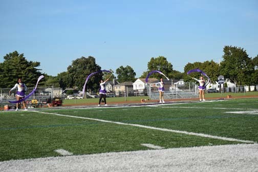 The Twirlers perform during halftime. 