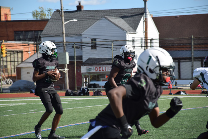 students in football game