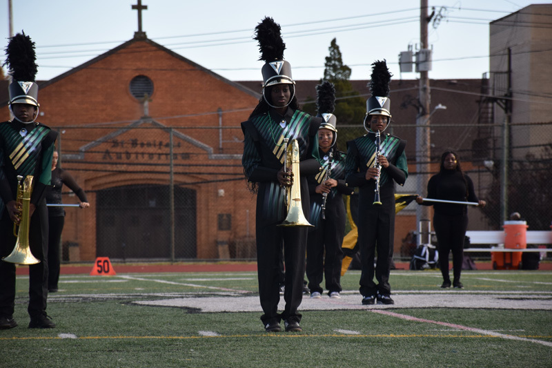 students in football game