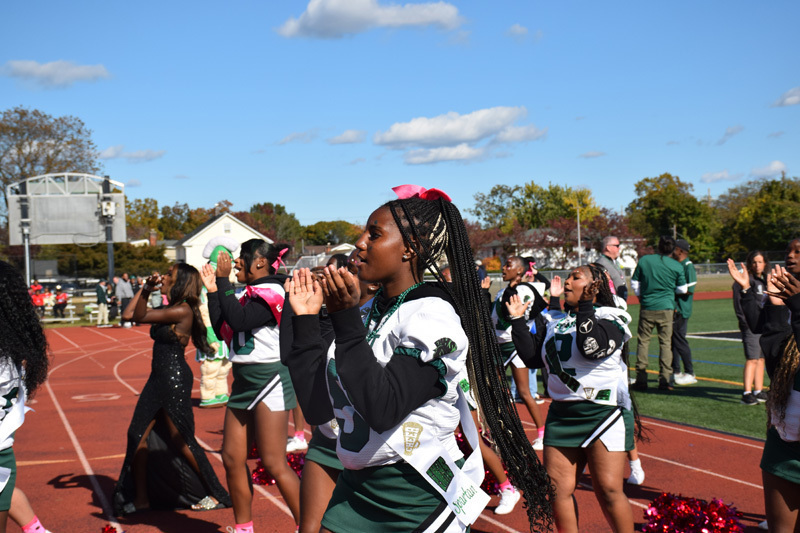 students in football game