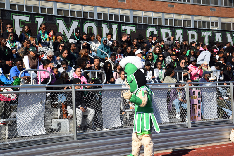 students in football game