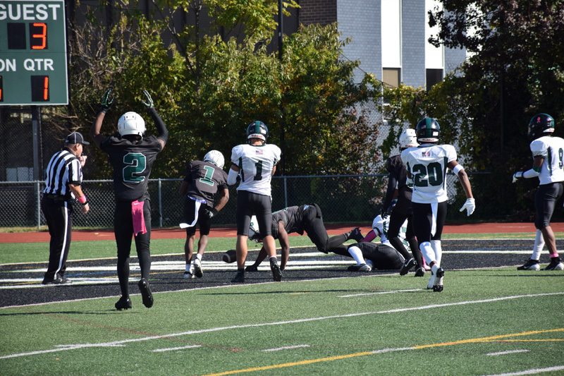 students in football game