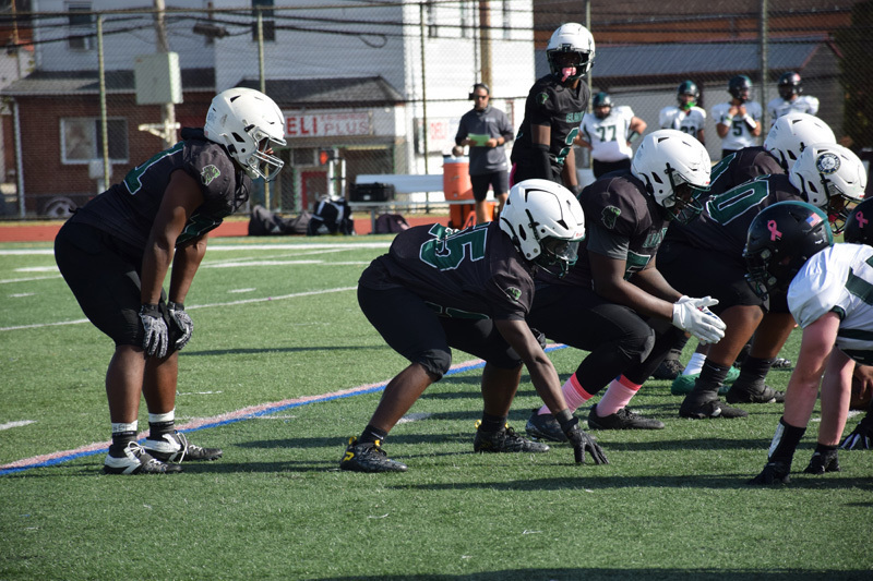 students in football game