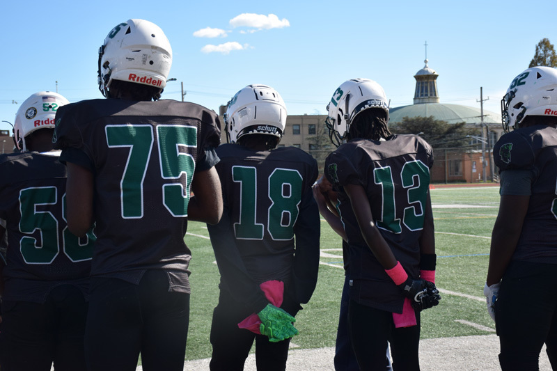 students in football game