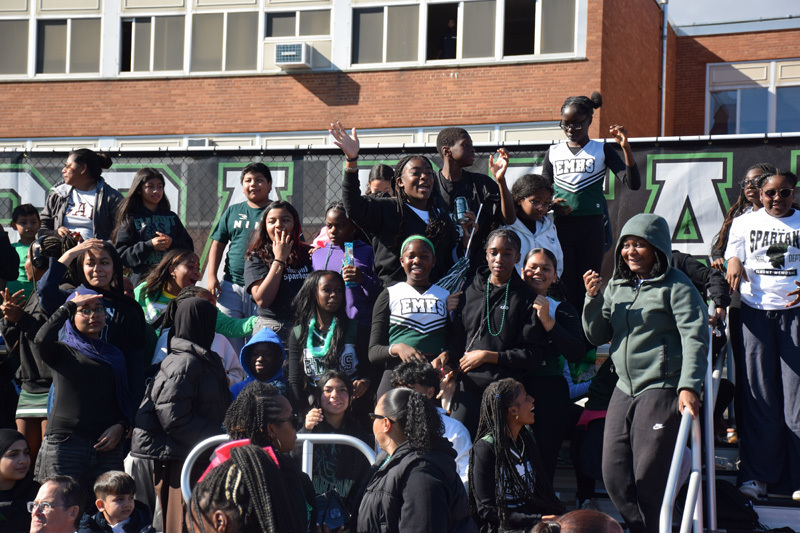 students in football game