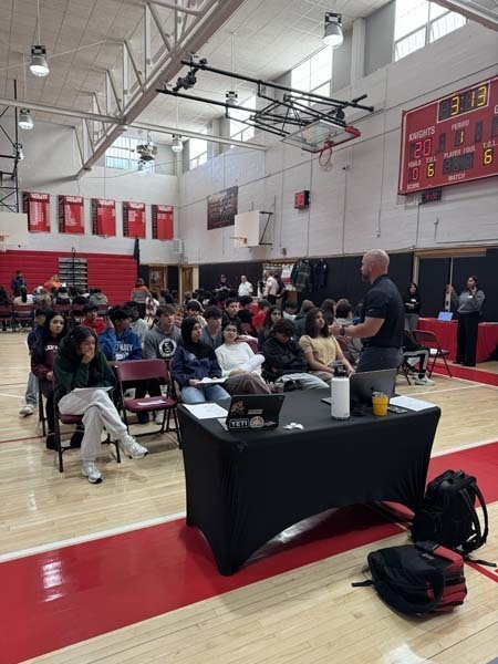 Students listening to guest speaker.