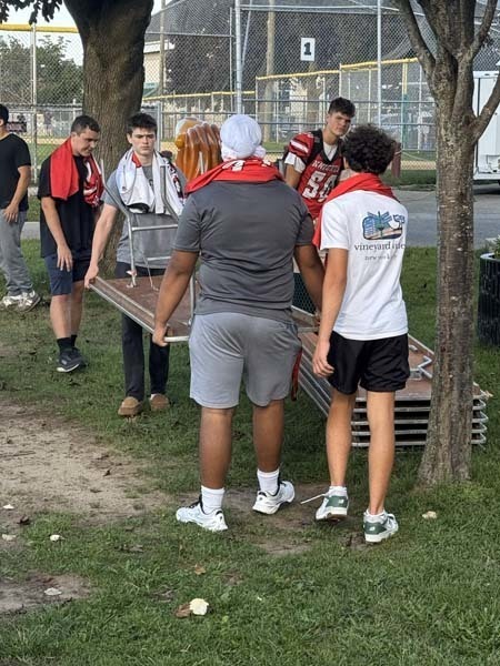 Floral Park Football team outside of venue.