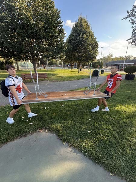 Floral Park Football team outside of venue.