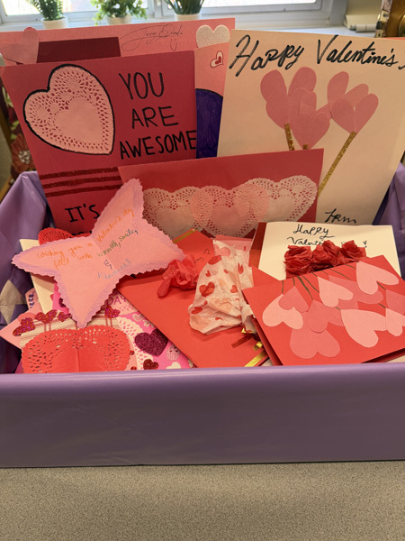  Assorted craft supplies are scattered around.