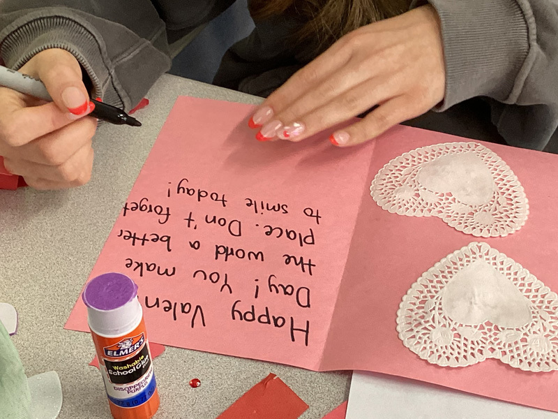  Assorted craft supplies are scattered around.