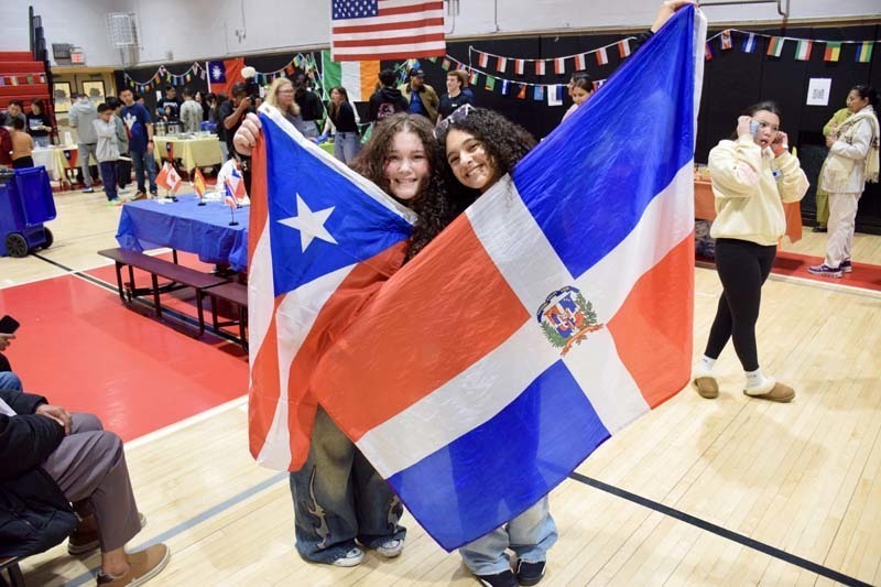 Students holding flags.