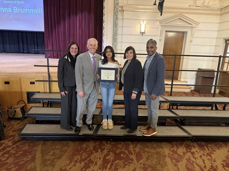 Students smiling with PTSA members.