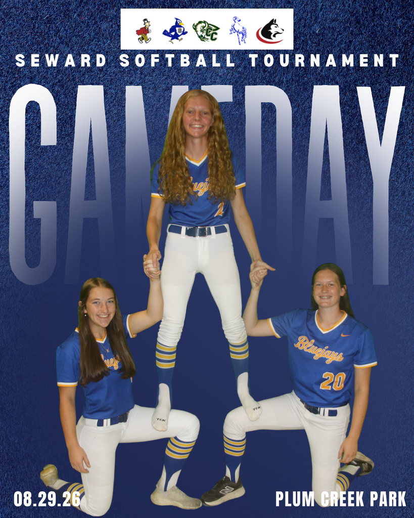 Smiling softball girls posing in a pyramid.