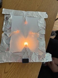 Our 8th grade scientists lit up the classroom today with an electrifying experiment on conductors and insulators.#ScienceRocks