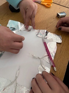 Our 8th grade scientists lit up the classroom today with an electrifying experiment on conductors and insulators.#ScienceRocks