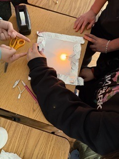 Our 8th grade scientists lit up the classroom today with an electrifying experiment on conductors and insulators.#ScienceRocks