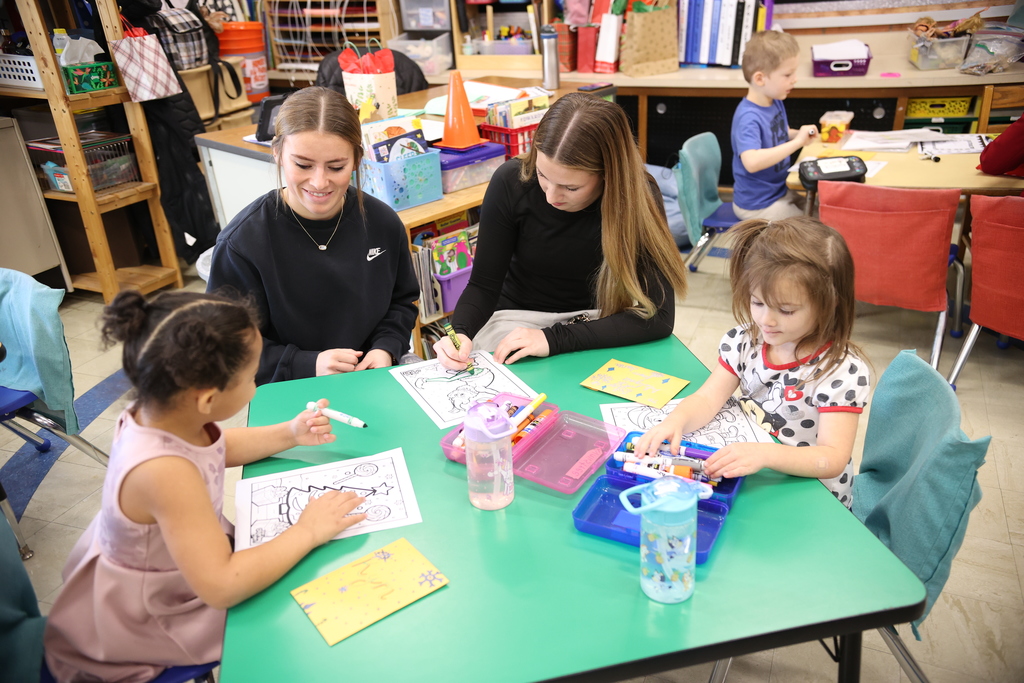 HS Students Reading Santa Letters to TS Students