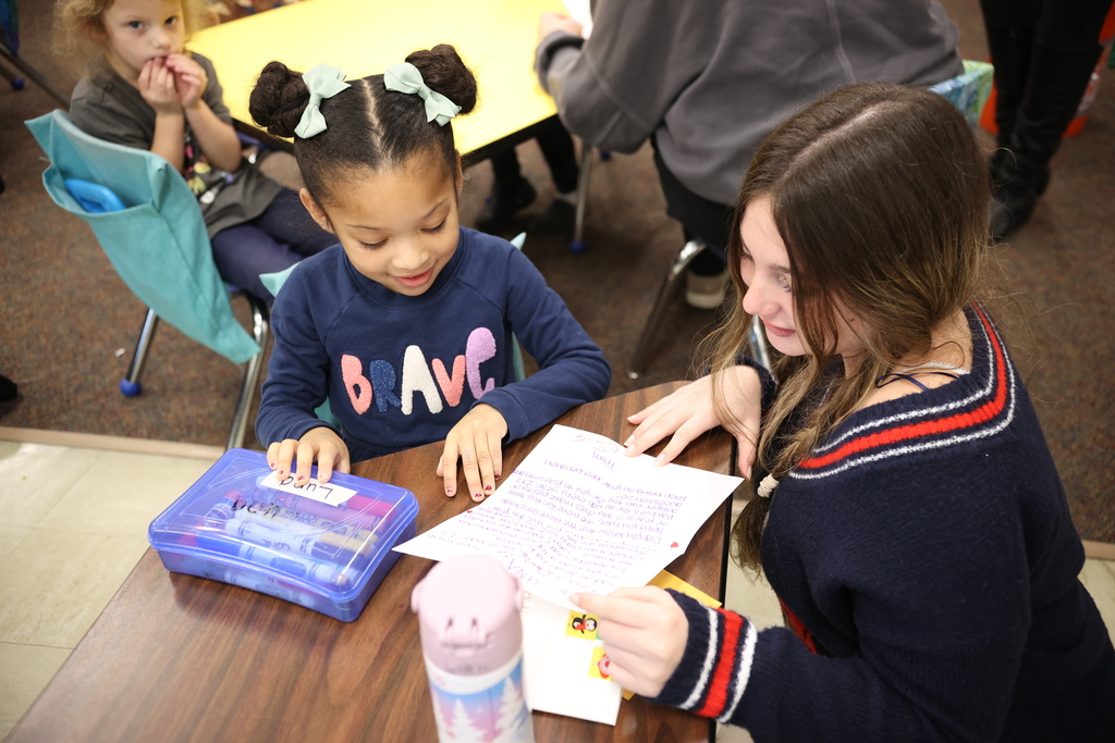 HS Students Reading Santa Letters to TS Students