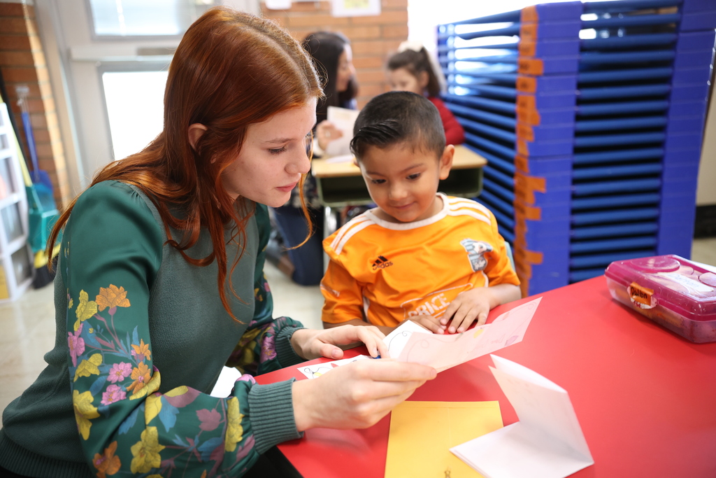 HS Students Reading Santa Letters to TS Students