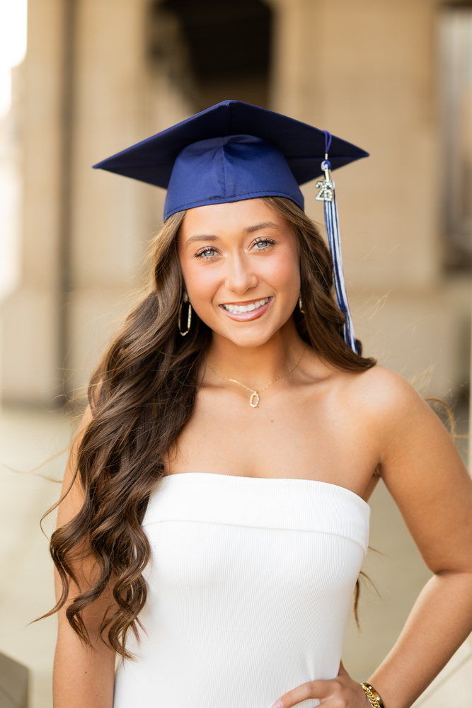 high school female in graduation cap