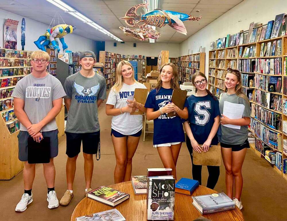 group of students in book store