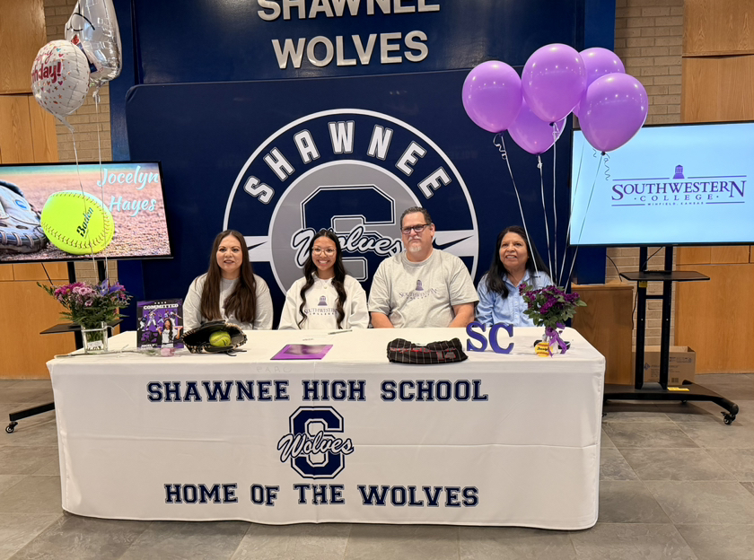 high school girl with parents and grandma at table
