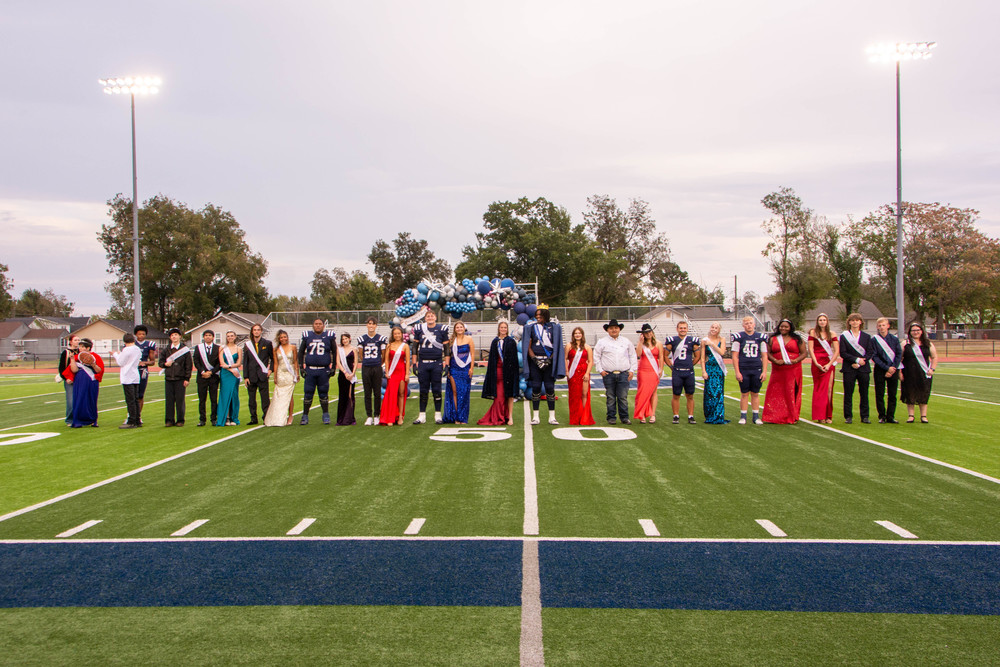 group of homecoming candidates on field