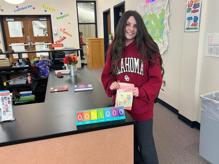 girl standing in library