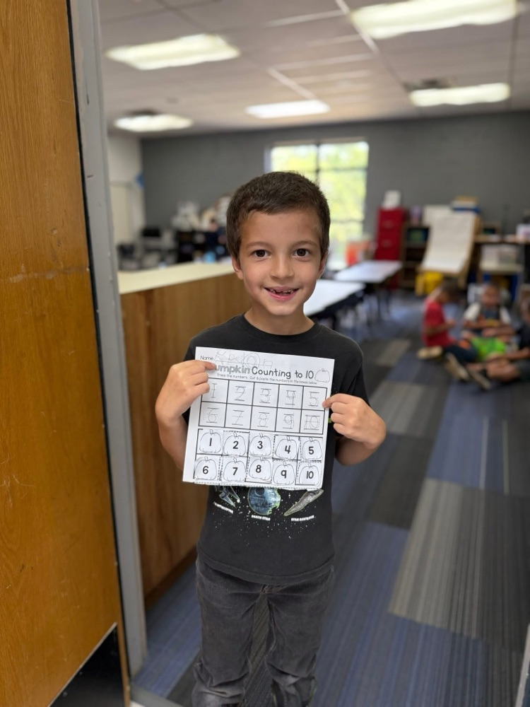 kid holding paper