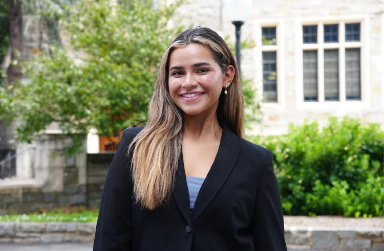 headshot of girl in black jacket 